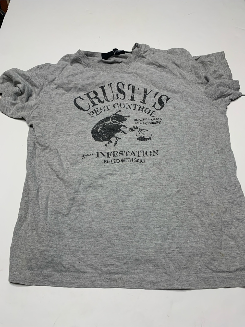 Rusty Heather Gray Graphic Pest Control Short Sleeve Tee